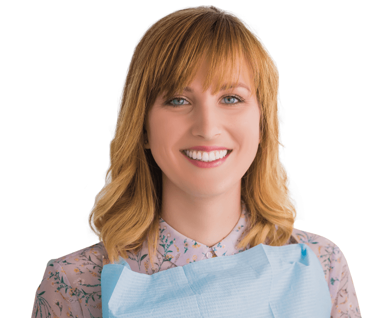 Woman in dental office smiling