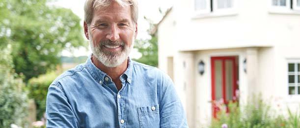 Man smiling with dental implants in Jacksonville