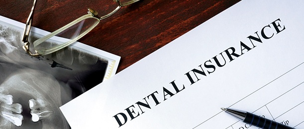 Dental insurance form resting on a table