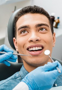 a patient receiving a dental checkup near Mandarin