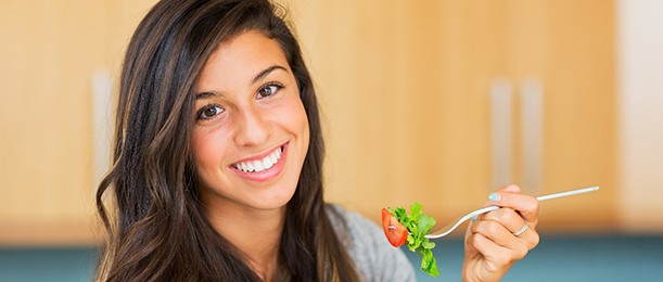 Woman eating salad in Jacksonville