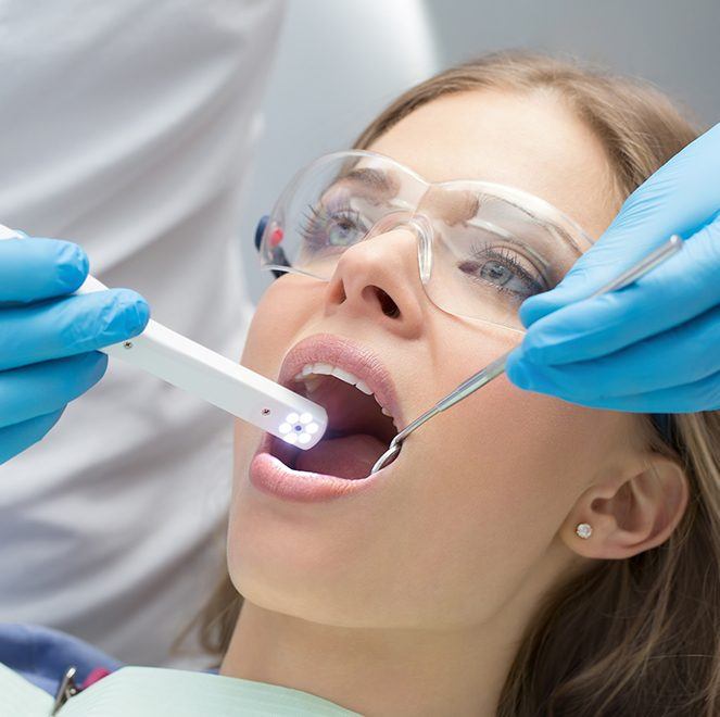 Dentist capturing intraoral images