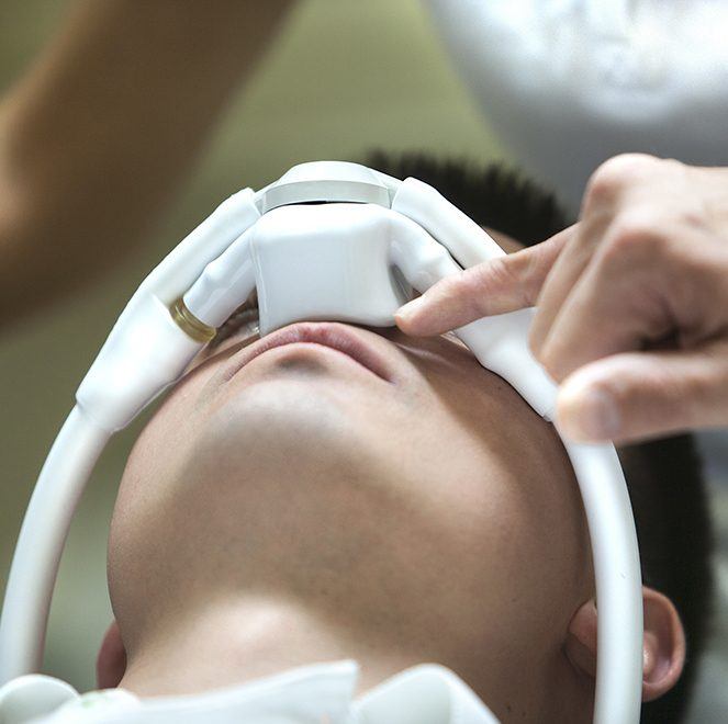 Relaxed dental patient with nitrous oxide mask