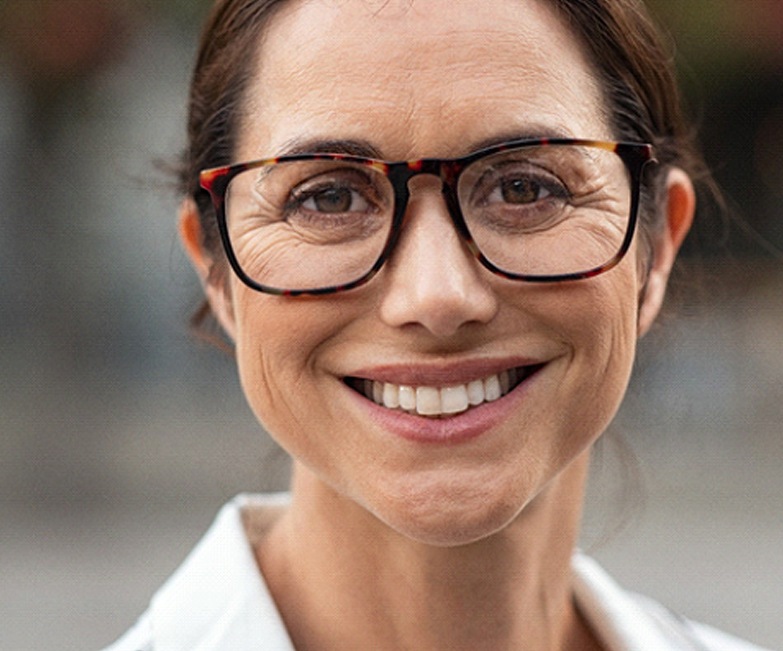 Woman smiling with tooth-colored fillings in Jacksonville