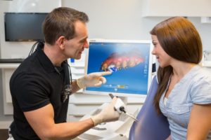 dentist in Jacksonville designing a CEREC crown for a patient