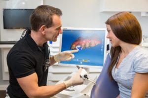 dentist in Jacksonville designing a CEREC crown for a patient 