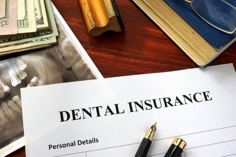 dental insurance form on table