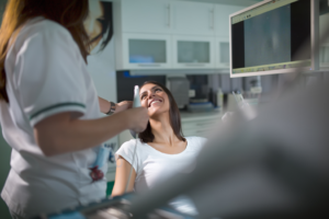 a patient visiting their dentist for a root canal