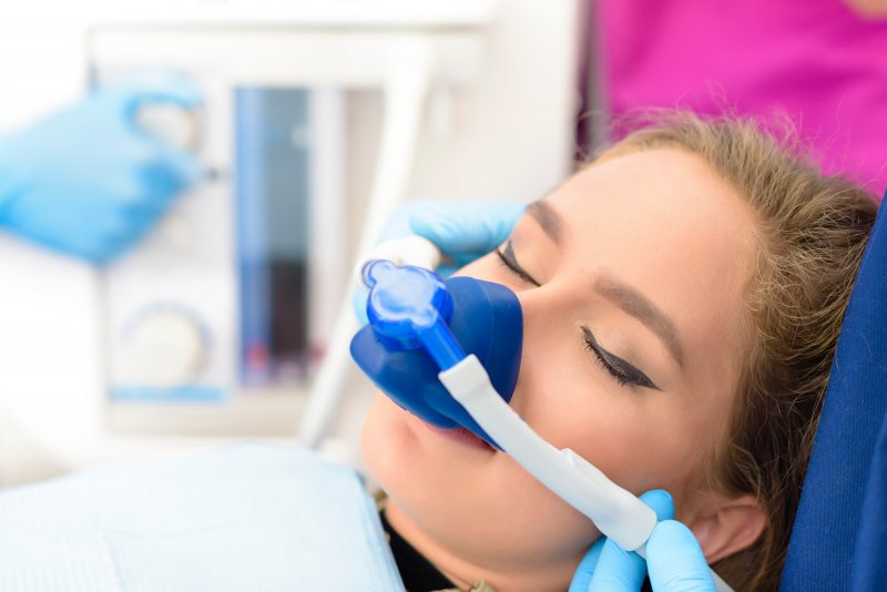 A woman receiving sedation dentistry 